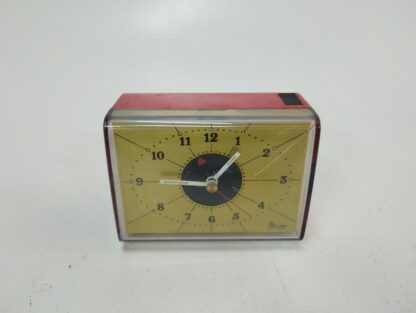 Reloj mesa rojo y dorado vintage