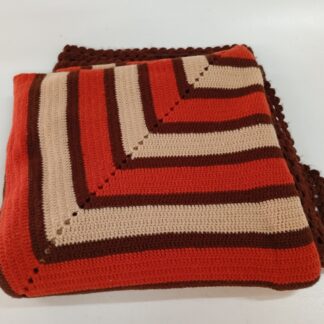 Manta sofá de ganchillo tonos marrones y naranja
